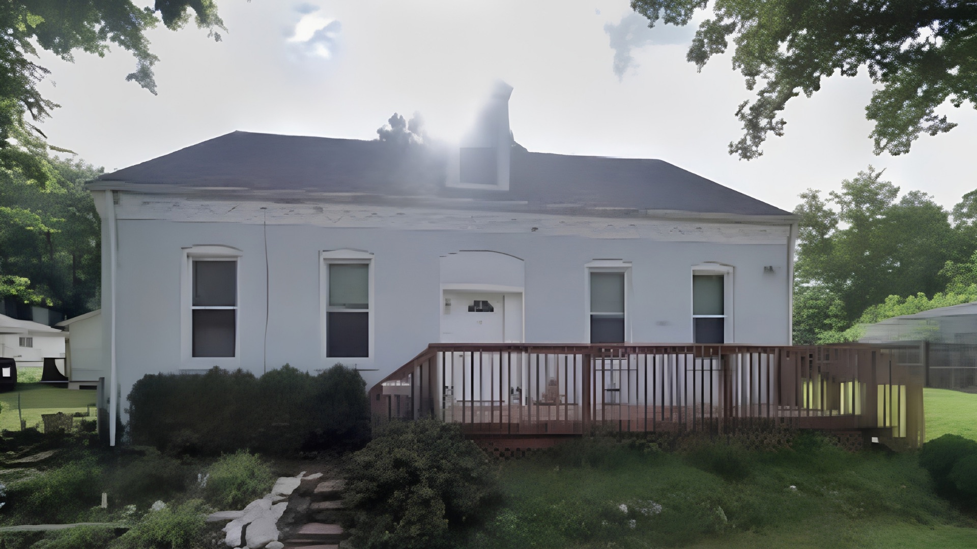 The house before: worn, faded shingles