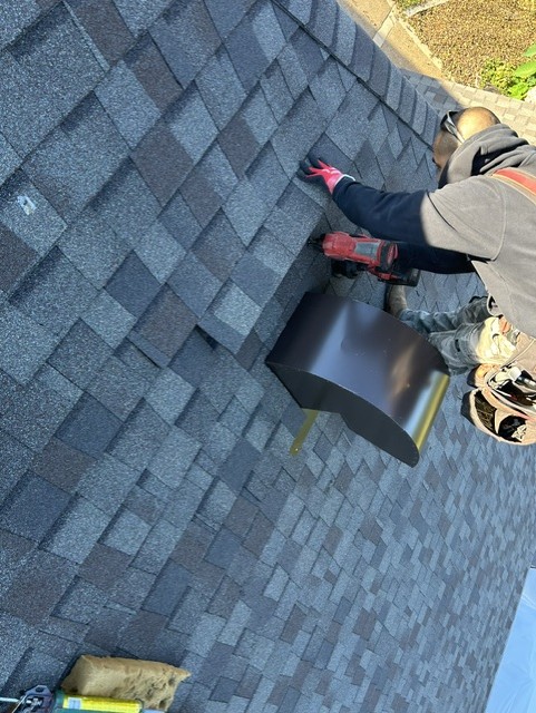 Barnes crew installing a new roof vent