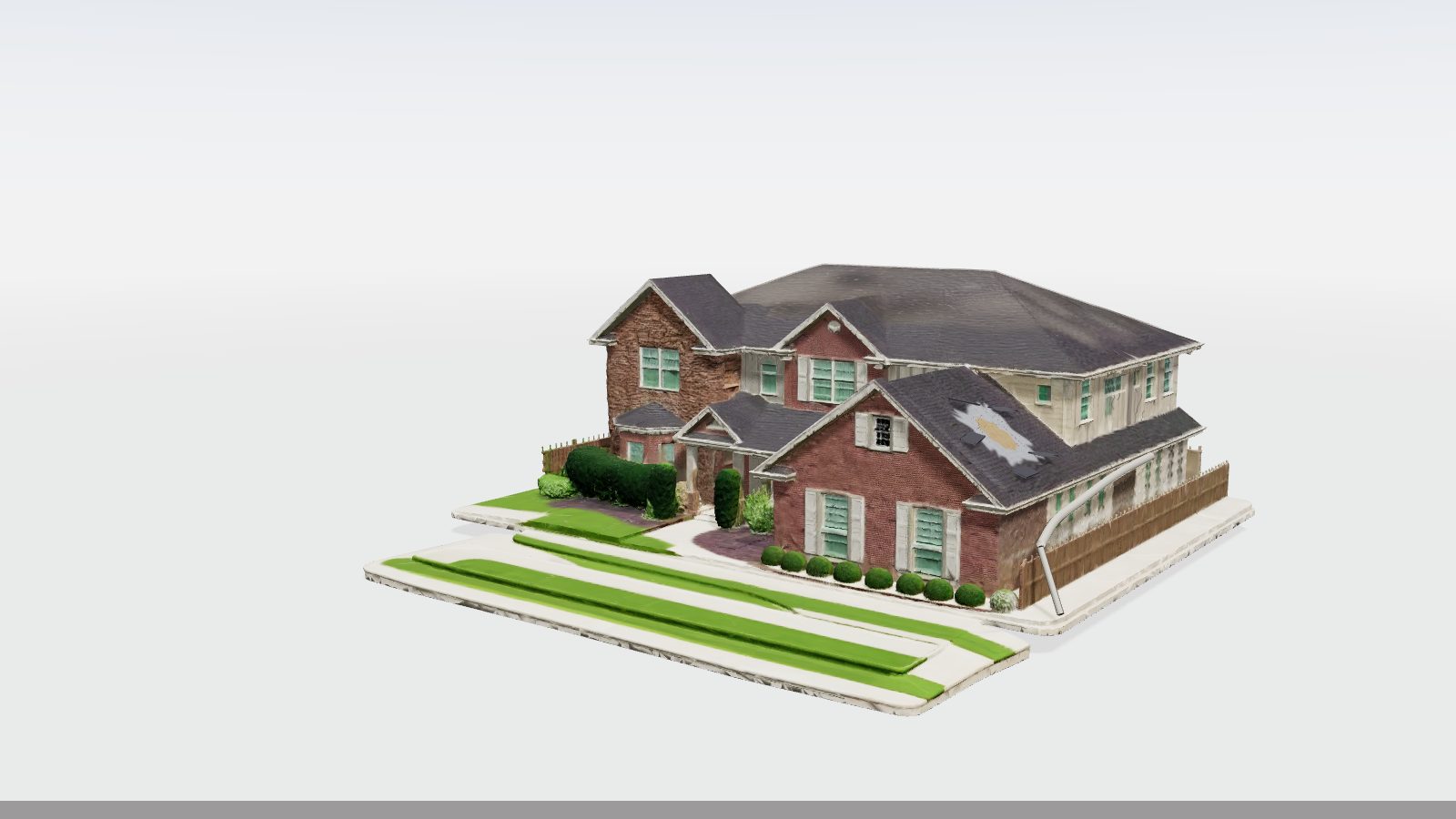 Two-storey brick and siding home that Barnes inspects for roof, gutter and siding damage